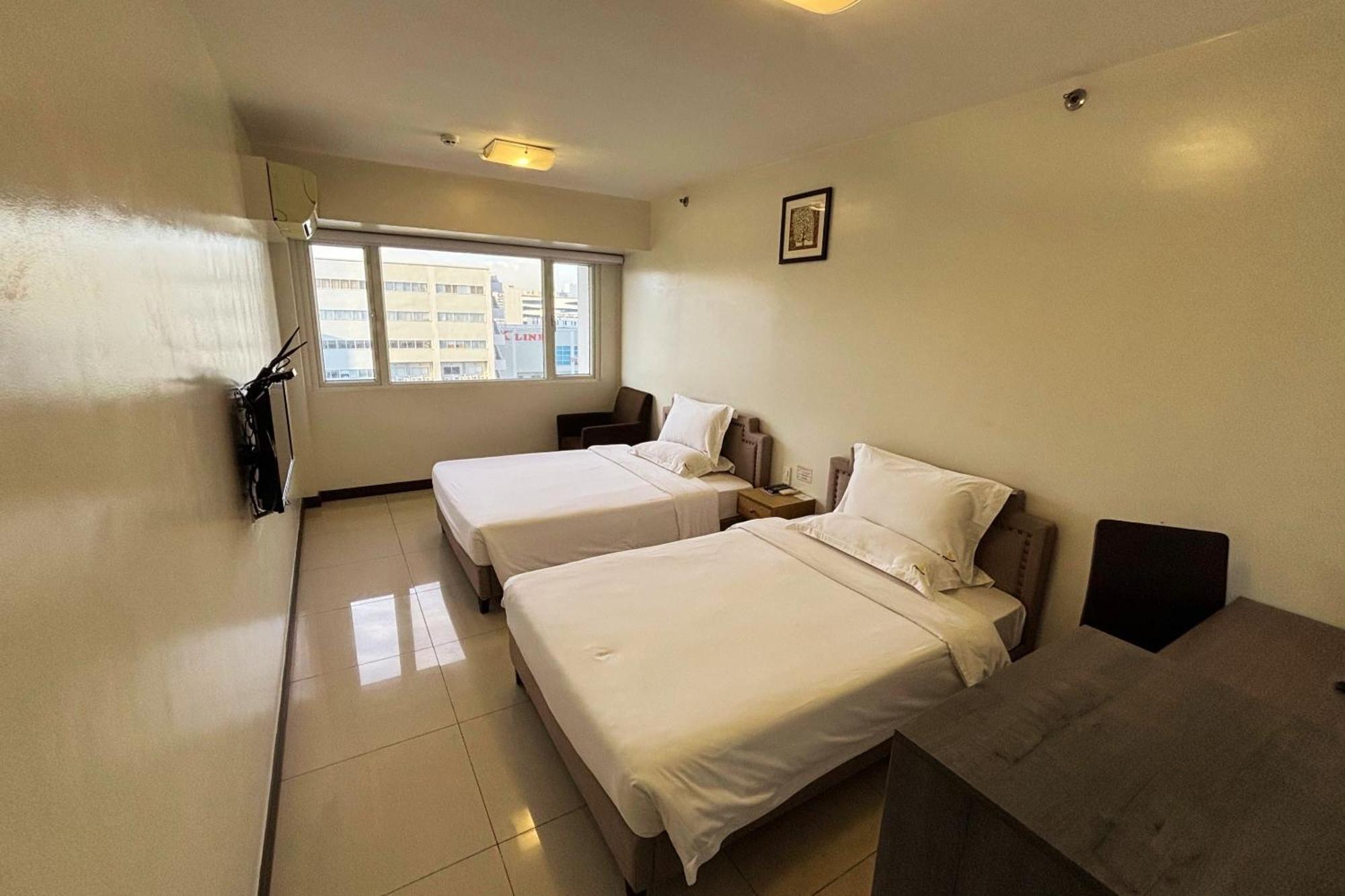 Extremeli Suites Manila Powered By Cocotel Zewnętrze zdjęcie